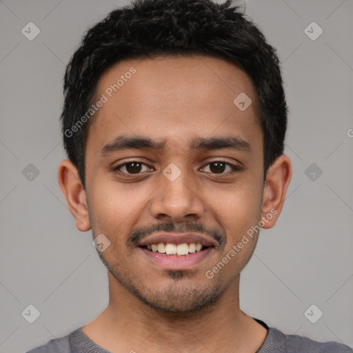 Joyful latino young-adult male with short  black hair and brown eyes