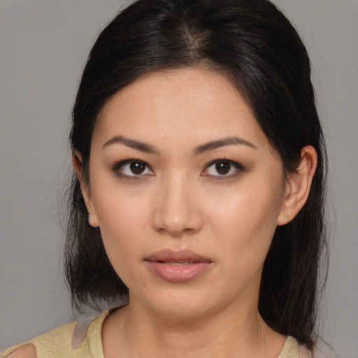 Neutral asian young-adult female with medium  brown hair and brown eyes