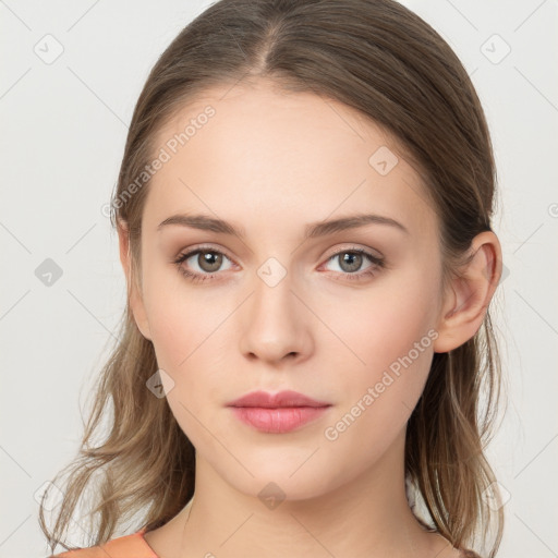 Neutral white young-adult female with medium  brown hair and grey eyes