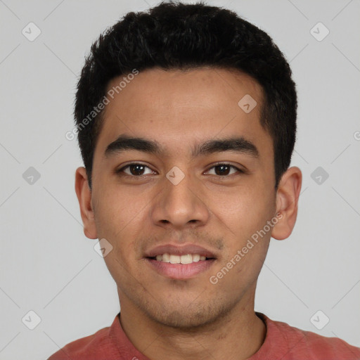 Joyful latino young-adult male with short  black hair and brown eyes