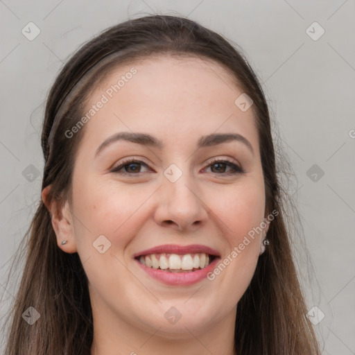 Joyful white young-adult female with long  brown hair and grey eyes