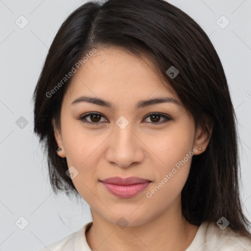 Joyful latino young-adult female with medium  brown hair and brown eyes