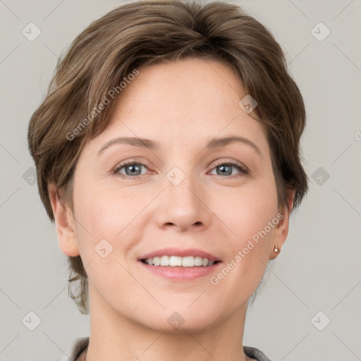 Joyful white young-adult female with short  brown hair and grey eyes