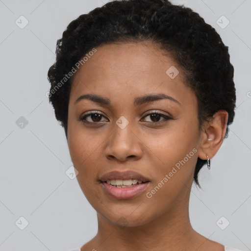 Joyful latino young-adult female with short  black hair and brown eyes