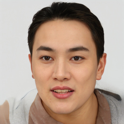 Joyful asian young-adult female with short  brown hair and brown eyes