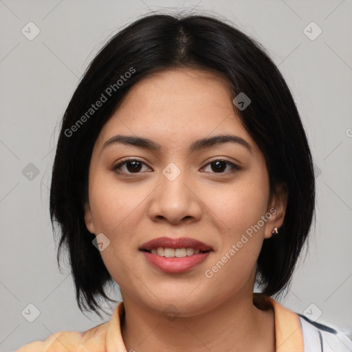 Joyful asian young-adult female with medium  black hair and brown eyes