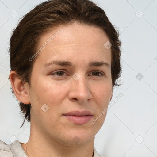 Joyful white adult female with short  brown hair and brown eyes