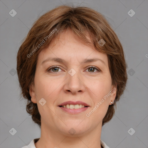 Joyful white adult female with medium  brown hair and grey eyes