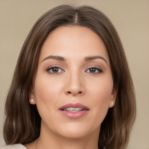 Joyful white young-adult female with medium  brown hair and brown eyes