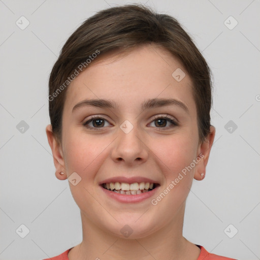 Joyful white young-adult female with short  brown hair and grey eyes