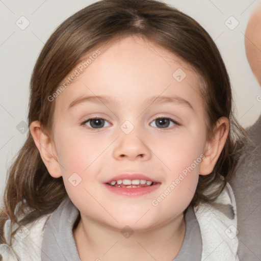 Joyful white child female with medium  brown hair and brown eyes