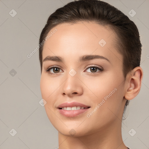 Joyful white young-adult female with medium  brown hair and brown eyes