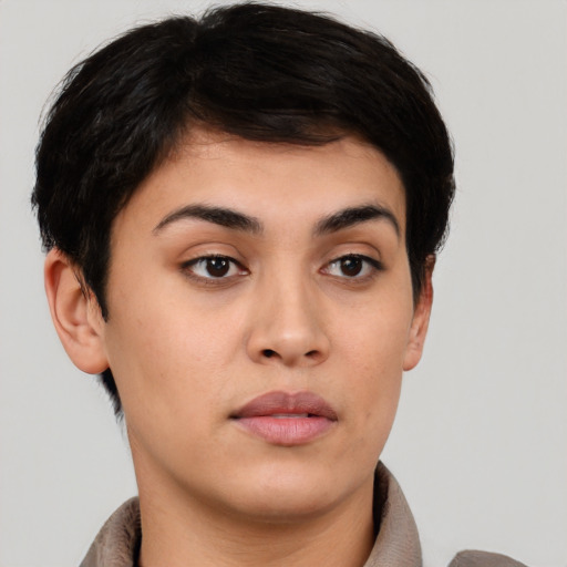 Neutral white young-adult female with short  brown hair and brown eyes