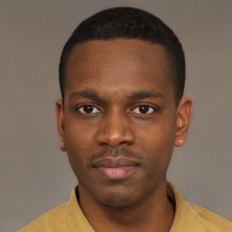 Neutral latino young-adult male with short  brown hair and brown eyes