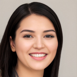 Joyful white young-adult female with long  black hair and brown eyes