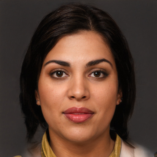 Joyful latino young-adult female with medium  brown hair and brown eyes