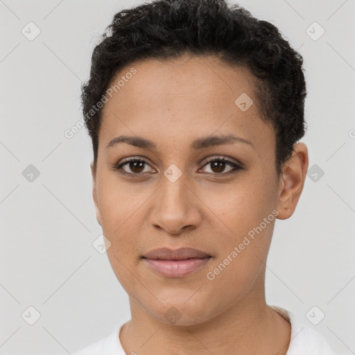 Joyful latino young-adult female with short  brown hair and brown eyes