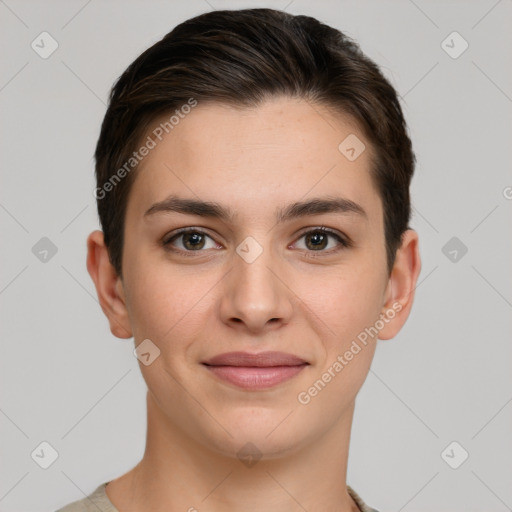 Joyful white young-adult female with short  brown hair and brown eyes