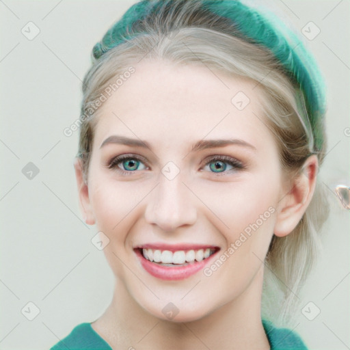 Joyful white young-adult female with medium  brown hair and blue eyes