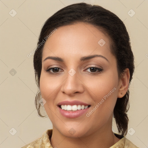 Joyful white young-adult female with long  brown hair and brown eyes