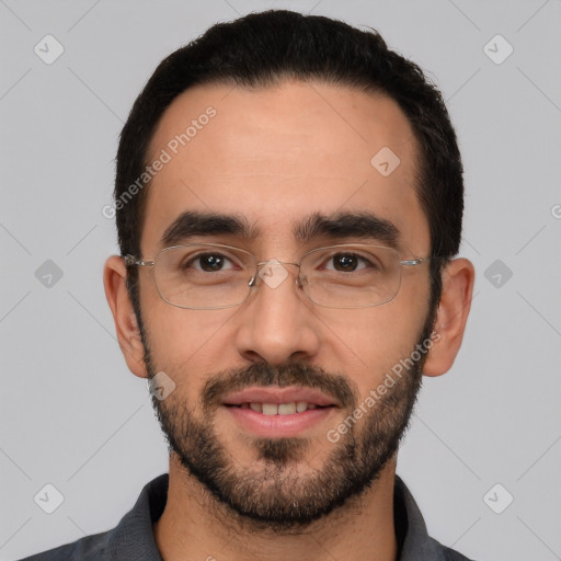 Joyful white young-adult male with short  black hair and brown eyes