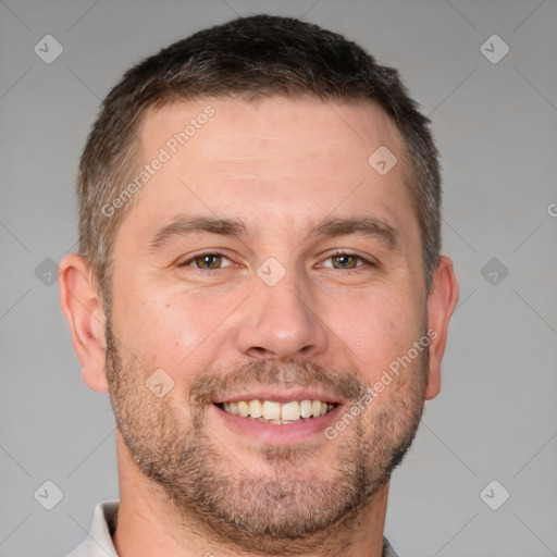 Joyful white adult male with short  brown hair and brown eyes