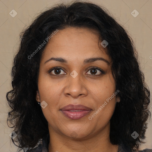 Joyful black adult female with medium  brown hair and brown eyes