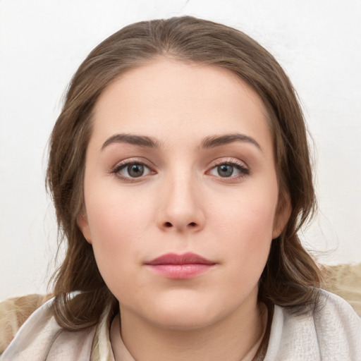 Neutral white young-adult female with medium  brown hair and grey eyes