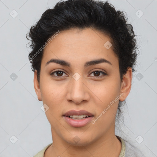 Joyful latino young-adult female with short  brown hair and brown eyes