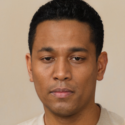 Neutral latino young-adult male with short  black hair and brown eyes