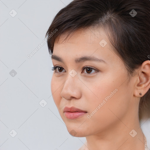 Neutral white young-adult female with short  brown hair and brown eyes