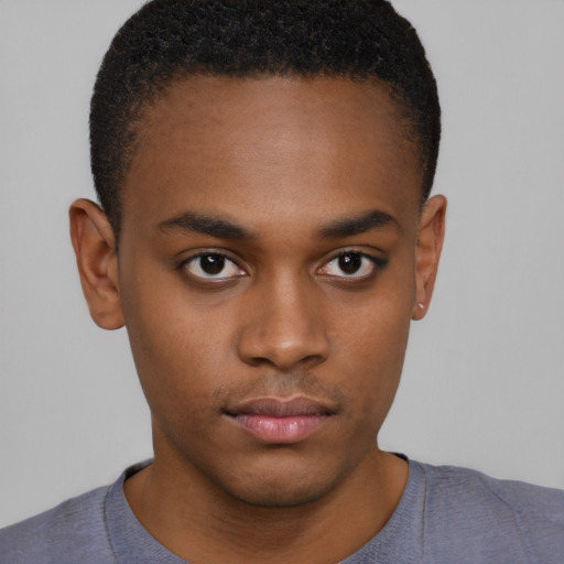 Neutral black young-adult male with short  brown hair and brown eyes