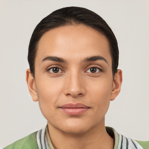 Joyful white young-adult female with short  brown hair and brown eyes