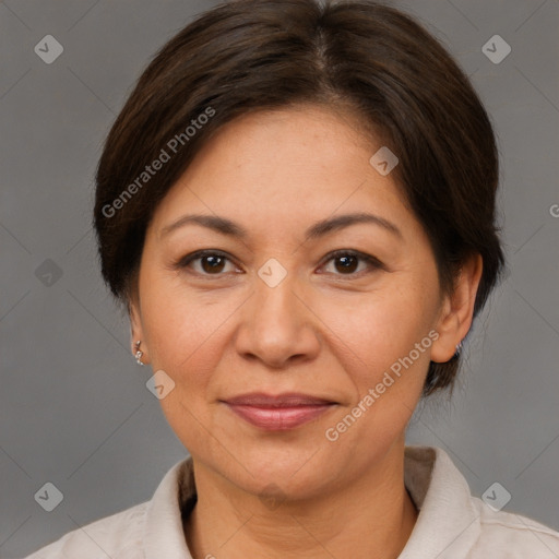 Joyful white adult female with medium  brown hair and brown eyes