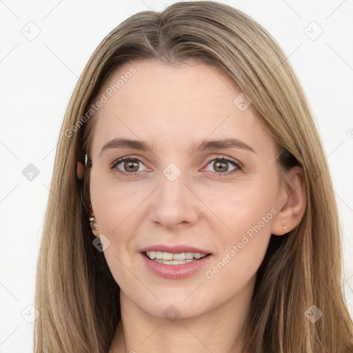 Joyful white young-adult female with long  brown hair and brown eyes