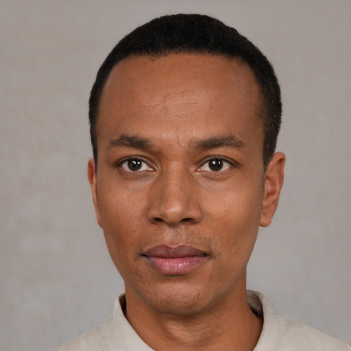 Neutral black young-adult male with short  black hair and brown eyes