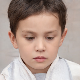 Neutral white child male with short  brown hair and brown eyes