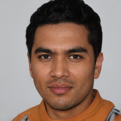 Neutral latino young-adult male with short  black hair and brown eyes