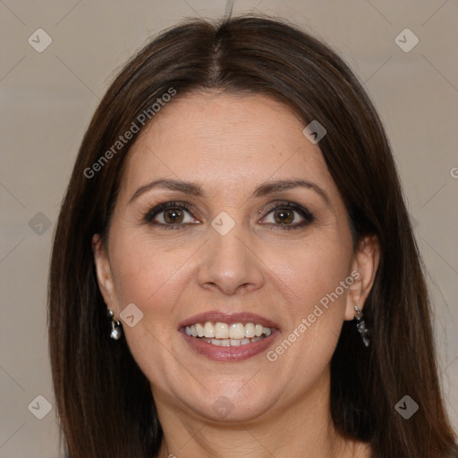 Joyful white adult female with medium  brown hair and brown eyes