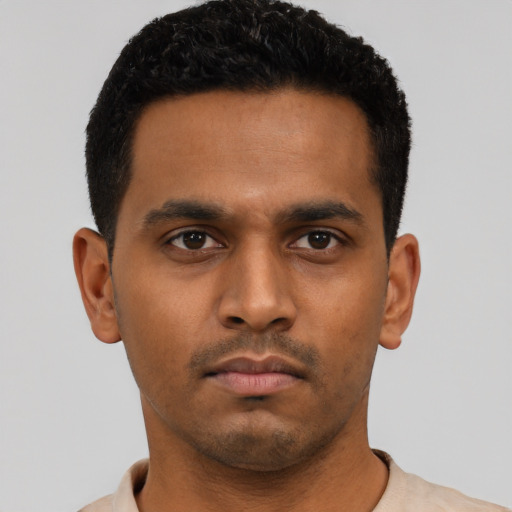 Neutral latino young-adult male with short  black hair and brown eyes
