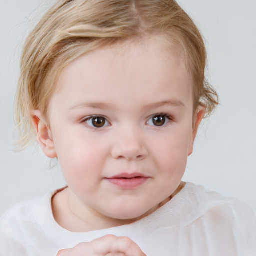 Joyful white child female with short  brown hair and blue eyes