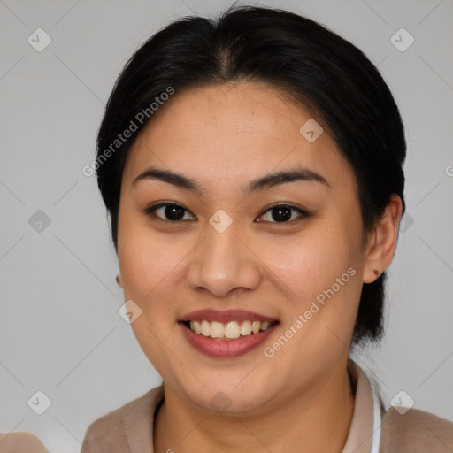 Joyful asian young-adult female with short  brown hair and brown eyes