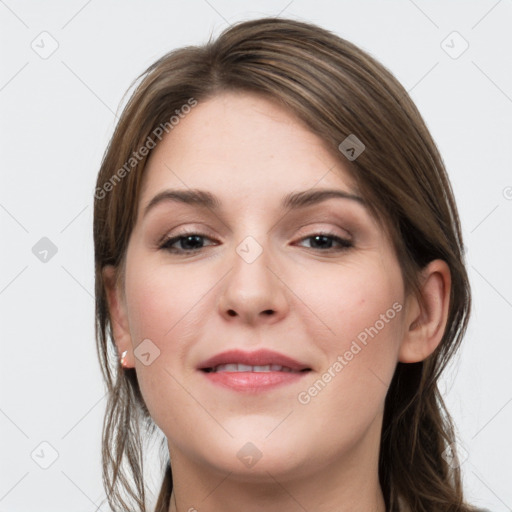 Joyful white young-adult female with long  brown hair and grey eyes