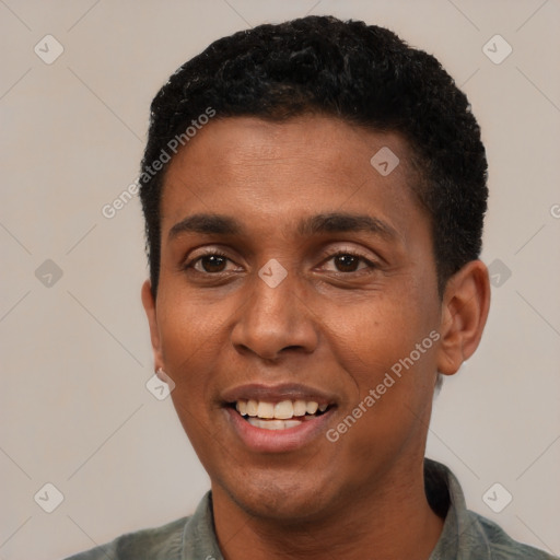 Joyful black young-adult male with short  black hair and brown eyes