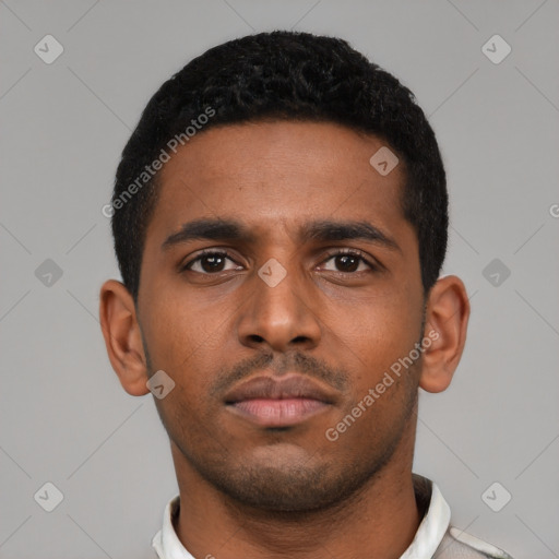 Neutral latino young-adult male with short  black hair and brown eyes