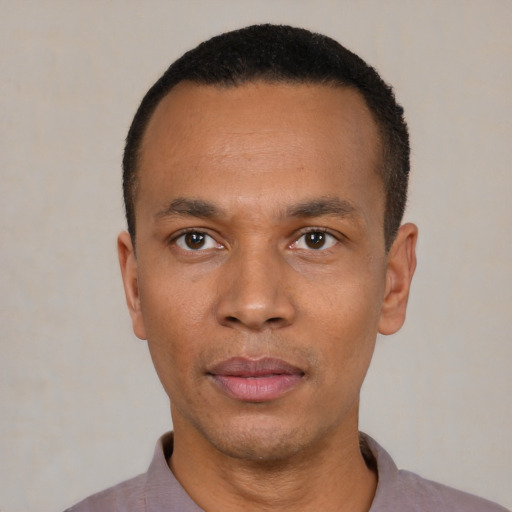 Neutral latino adult male with short  black hair and brown eyes