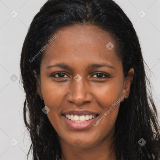 Joyful latino young-adult female with long  brown hair and brown eyes