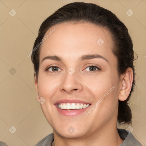 Joyful white young-adult female with medium  brown hair and brown eyes