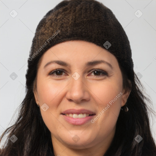 Joyful latino young-adult female with long  brown hair and brown eyes