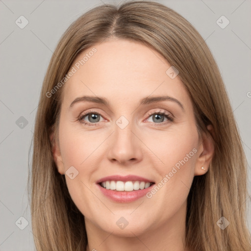 Joyful white young-adult female with long  brown hair and grey eyes